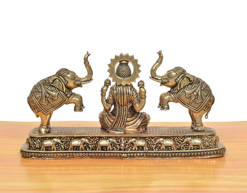 Bronze Gaj Lakshmi Goddess Sitting Statue (Height: 4 Inch)