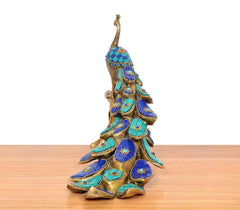 Brass peacock ornament, full view with multicolor blue and turquoise stonework body