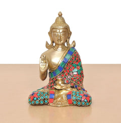 Front view Brass Buddha idol seated, gold tone, multicolor jeweled robe