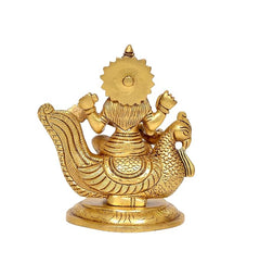 Back view of brass Saraswati sitting on swan, detailed textured patterns