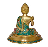 Brass Buddha statue back view, teal robe with gold details, 15 inches tall