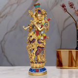 Brass Lord Krishna sculpture with jeweled crown, flute, blue jeweled base