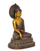 Seated Buddha statue side angle, brass face and hands, detailed patterned sash
