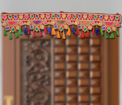 Diwali toran door hanging with heart motifs, jeweled trim, and multi-color tassels