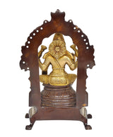 Lakshmi brass idol statue, back view with arched halo and seated posture