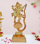 Brass Lord Ganesha dancing on Shesha Naag statue, raised arms, ornate detailing