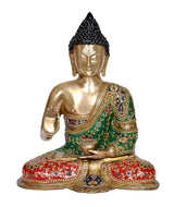Meditating Buddha idol, front view: gold body, black textured ushnisha, green-red robe.