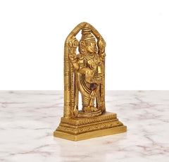 Brass Tirupati Balaji idol, angled view, arms raised in arched frame