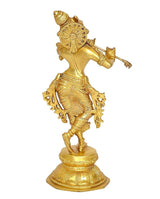 Krishna brass statue playing flute, close side view of torso and flute, round base