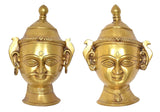 Brass Shiva Gauri head wall hanging, angled front view with crown finial