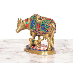 Brass cow and calf figurine on round base, multicolor inlay, side profile