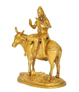 Brass Shiva riding Nandi with trident, side view religious deity statue