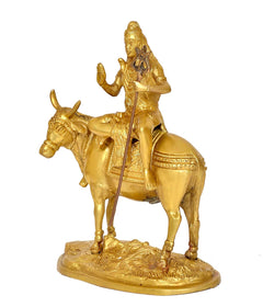 Brass Shiva riding Nandi with trident, side view religious deity statue