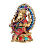Brass Ganesha statue idol, side view with blue and red beaded frame and lotus base