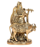 Brass Radha-Krishna idol with cow, rear/side view, detailed textures and drapery