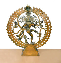Brass Natraj Lord Shiva dancing idol, back/angled view with arched halo and base