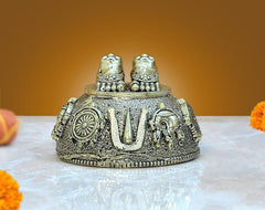 Brass charan paduka idol with two feet, engraved detailing, front view