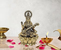 Brass Saraswati goddess figurine seated on lotus with veena, 6 inch