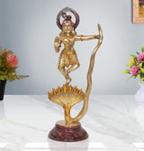 Brass Krishna statue dancing on Kaliya serpent, halo and maroon pedestal base