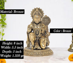 Bronze-tone Hanuman JI sitting sculpture with decorative halo and raised mace, 8 in