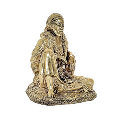 Three-quarter view brass Shirdi Sai Baba idol statue, seated and draped robe (4 in).