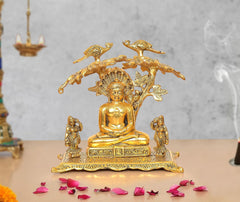 Mahavir Swami metal idol, seated figure with ornate tree and bird motifs