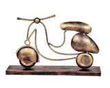 Iron scooter tabletop figure, bronze wheel and handle design on dark rectangular stand