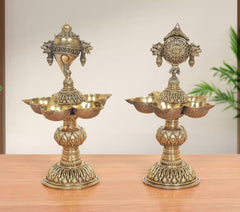Brass five-diya shankh oil lamp stand with Vishnu symbol and ornate base