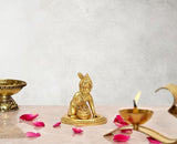 Brass Laddu Gopal idol statue, seated child Krishna with crown, round pedestal
