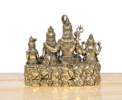 Back/side view of 7-inch brass Shiv Parivar family idol on rocky platform