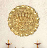 Brass Panchmukhi Ganesha wall hanging with five-faced relief in round frame