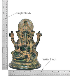 Handcrafted brass Ganesha statue (Height: 9 in, Width: 6 in), seated with halo