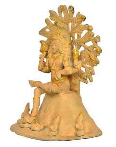 Brass Dakshinamurti Shiva statue from side view, patterned base with small seated figures