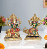 Brass Lakshmi & Ganesha deity statue set, colorful painted ornaments on gold-tone idols
