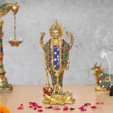 Brass Vishnu standing idol, multicolor jeweled torso and raised hands on lotus base.