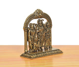 Brass Ram Darbar statue from rear angle, ornate base and arched frame detail