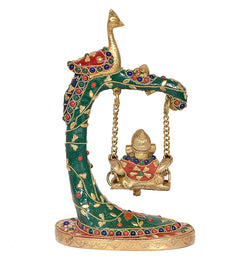 Front view brass Ganesha on peacock swing statue with red, blue and green accents