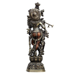 Brass Krishna idol statue from behind, circular halo backplate and ornate base