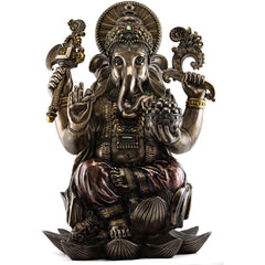 Ganesha resin statue, seated, four arms raised, detailed crown and jewelry