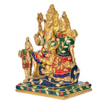 Side view Brass Shiv Parivar idol: Shiva with raised hand and seated attendants