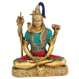 Shiva brass statue, seated with trident; turquoise top and red pants; 8 inch