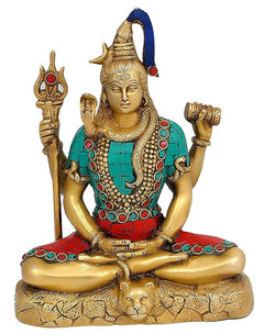 Shiva brass statue, front view; blue hair, trident and drum hands; turquoise and red