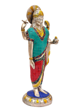 Brass Dhanvantari deity statue, hands raised, teal and red robe, gold accents, blue pedestal