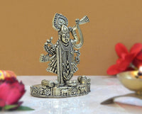 Brass Shreenathji Thakurji statue, 4 inch, detailed face, crown, and hanging ornaments