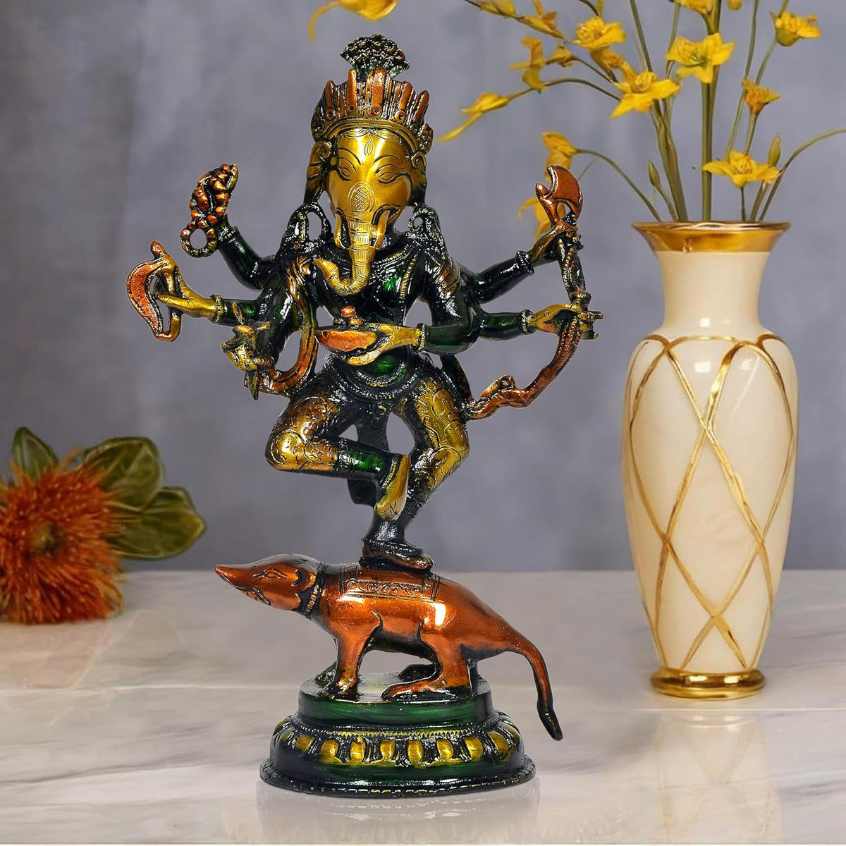 AONA brass dancing Ganesha idol with six arms, golden face, on brown mouse base