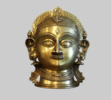Brass Gauri head sculpture, gold and silver face with tiara, ornate circular earrings