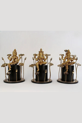 Brass idol set: Lakshmi, Ganesha, Saraswati on black pedestal bases, 18-inch height