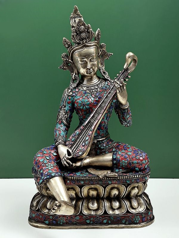Saraswati idol: seated brass statue with veena, ornate inlay, 22 in