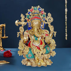 Brass Ganesha statue, seated, ornate crown with colorful accents, 16 in tall