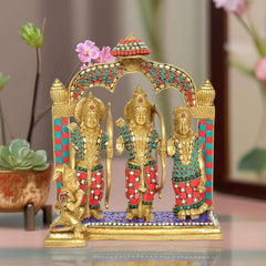 Brass Ram Darbar statue idol with three golden figures, colorful red/blue attire, arched frame